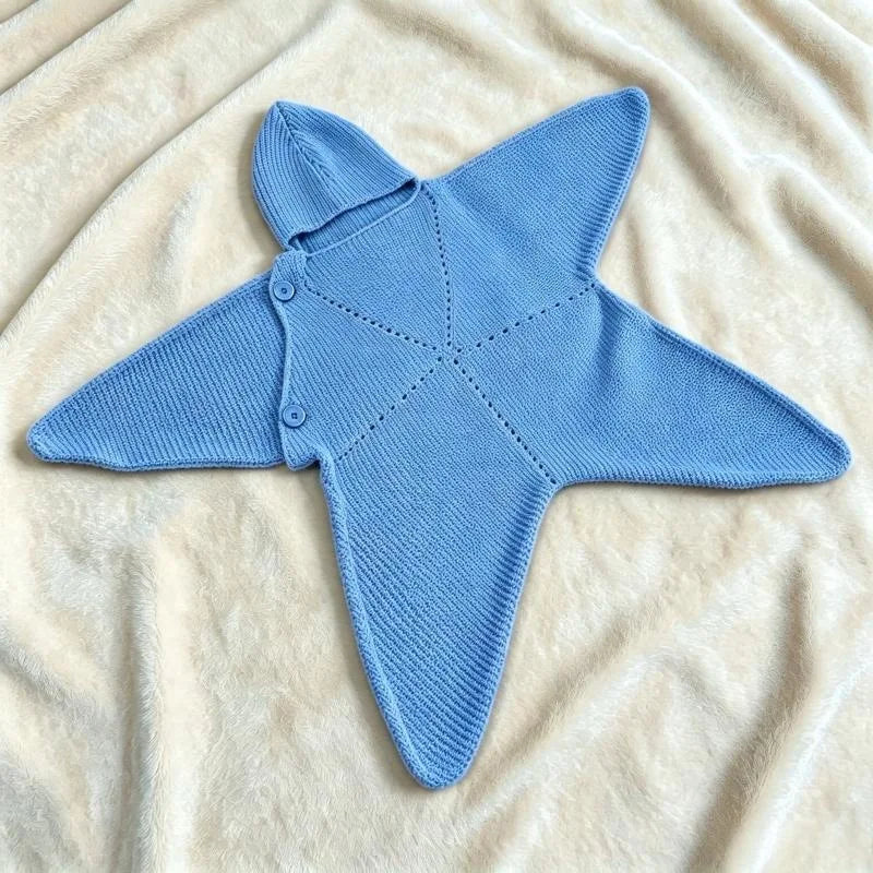 Blue Starfish outfit laid flat, showing hood and buttons