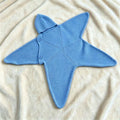 Blue Starfish outfit laid flat, showing hood and buttons